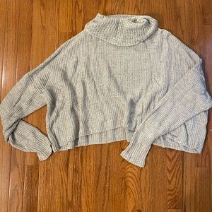 Ripped boxy cut cowl neck sweater